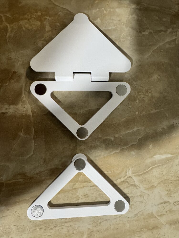 The two parts of the Screen Pass-Thru: the outside door unit and the plain inside frame, showing the magnets